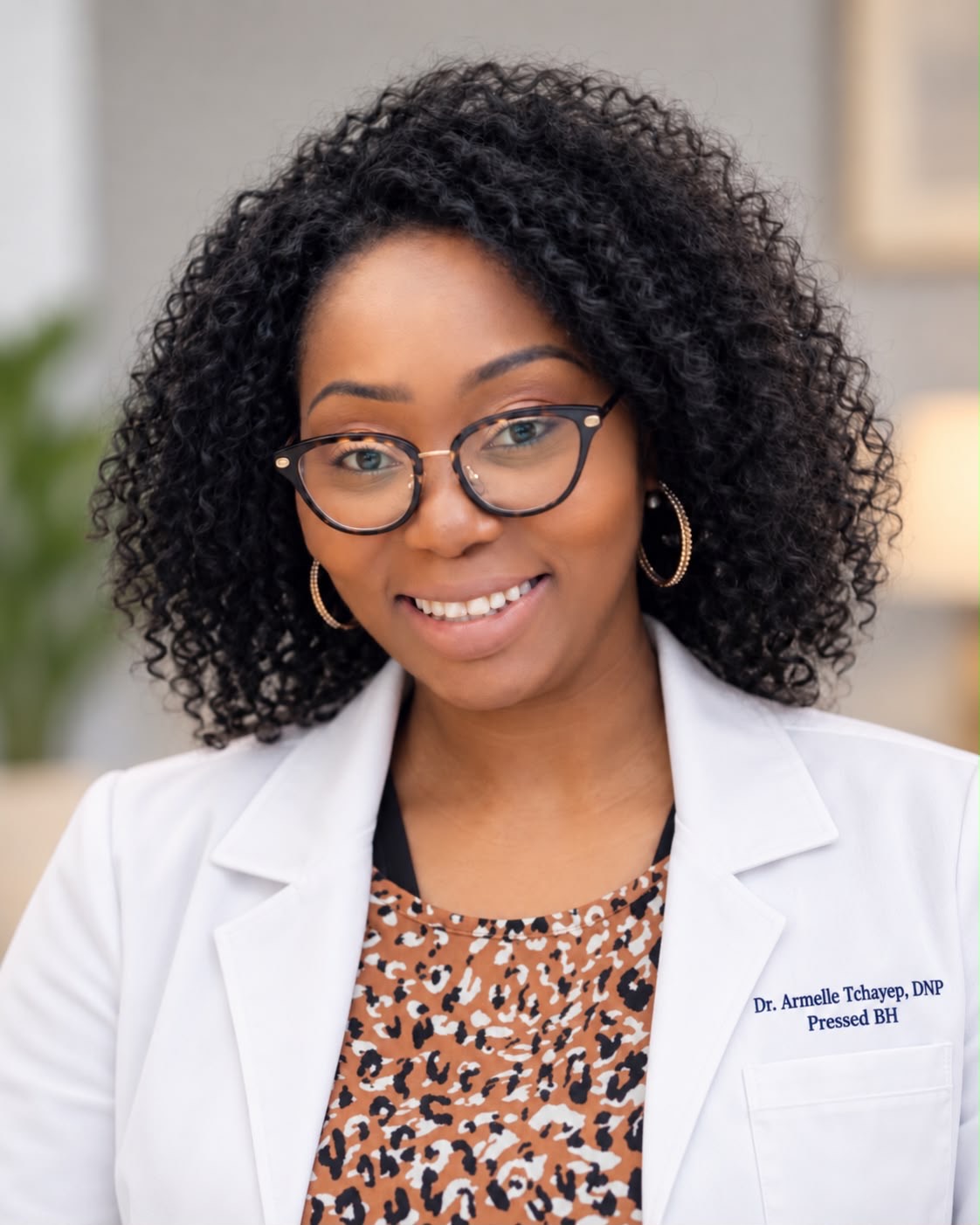 Portrait of Armelle Tchayep, psychiatric mental health nurse practitioner, smiling